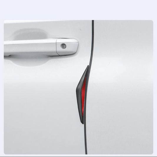 Car Life 3D Electroplated Door Edge Guard actively protecting a car door from a collision with a wall, demonstrating effective impact absorption and paint scratch prevention.